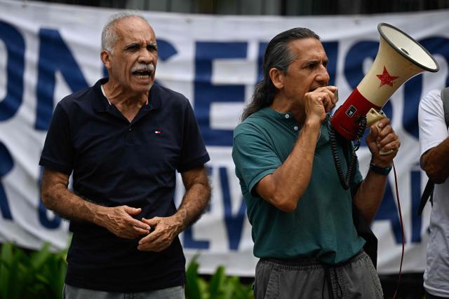 Opponents to the Venezuelan government shout slogans during a protest demanding presidential elections in Caracas on August 20, 2026. (Photo by Federico PARRA / AFP)