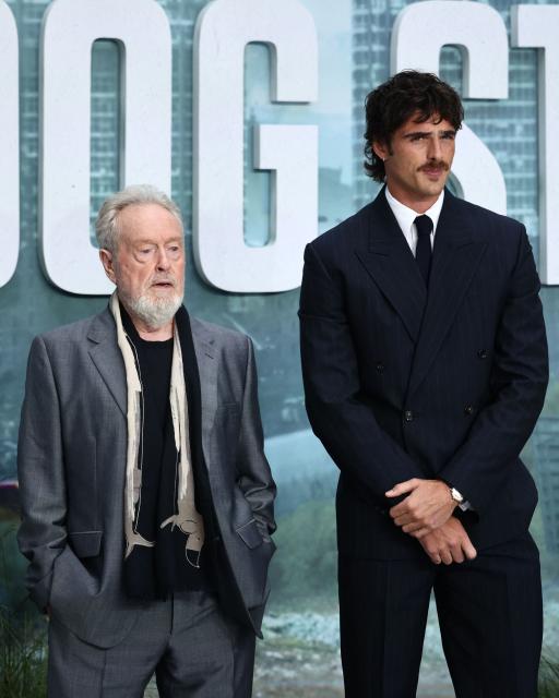 British director Ridley Scott (L) and US actor Jacob Elordi pose upon arrival on the red carpet for the world premiere of the film 'The Dog Stars', in central London on August 20, 2026. (Photo by Henry NICHOLLS / AFP)