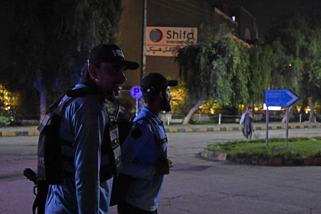 Security personnel cordon off a street outside the Shifa International Hospital in Islamabad on August 20, 2026 after Pakistan's Supreme Court ordered to transfer jailed former prime minister Imran Khan to hospital for medical treatment. Pakistan's Supreme Court ordered on August 18 that Khan be moved to hospital for medical checks, after a petition by his lawyers over claims of poor health. (Photo by Aamir QURESHI / AFP)