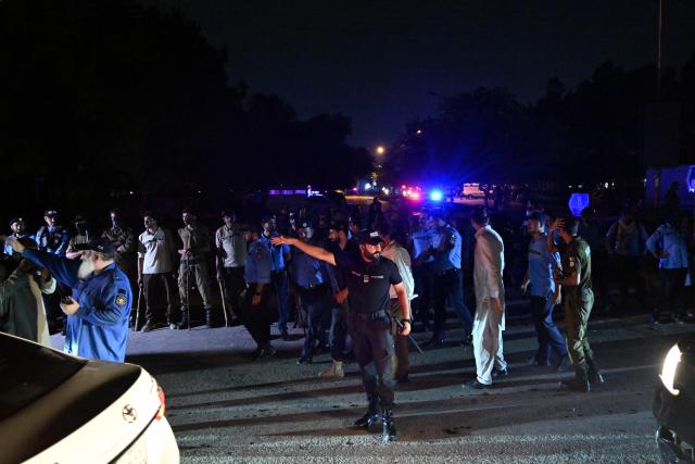 Security personnel cordon off a street outside the Shifa International Hospital in Islamabad on August 20, 2026 after Pakistan's Supreme Court ordered to transfer jailed former prime minister Imran Khan to hospital for medical treatment. Pakistan's Supreme Court ordered on August 18 that Khan be moved to hospital for medical checks, after a petition by his lawyers over claims of poor health. (Photo by Aamir QURESHI / AFP)
