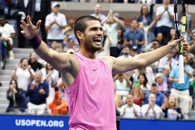 (FILES) Spain’s Carlos Alcaraz celebrates after defeating Italy’s Jannik Sinner during their men's singles final tennis match on day fifteen of the US Open tennis tournament at the USTA Billie Jean King National Tennis Center in New York City, on September 7, 2025. Carlos Alcaraz announced on August 20, 2026 that he will return at the US Open to defend his title after recovering from a wrist injury that has sidelined him for the past four months. (Photo by kena betancur / AFP)