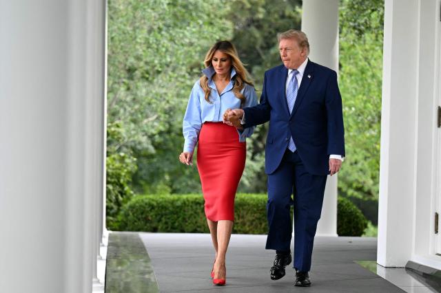US President Donald Trump and US First Lady Melania Trump arrive to host an event with IndyCar and FOX Sports to expand academic opportunities for individuals transitioning from foster care, in the Rose Garden of the White House, in Washington, DC, on August 20, 2026. (Photo by Jim WATSON / AFP)