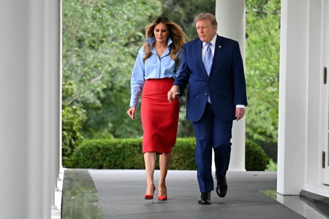 US President Donald Trump and US First Lady Melania Trump arrive to host an event with IndyCar and FOX Sports to expand academic opportunities for individuals transitioning from foster care, in the Rose Garden of the White House, in Washington, DC, on August 20, 2026. (Photo by Jim WATSON / AFP)