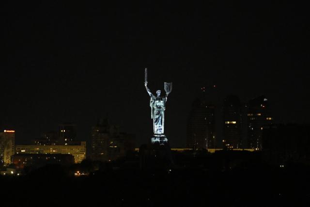 This photograph shows a light and audiovisual installation "The Future Remembers" projected on the Motherland Monument to mark the 35th anniversary of Ukraine's independence in Kyiv on August 20, 2026, amid Russia’s invasion of Ukraine. (Photo by Evgen KOTENKO / AFP)