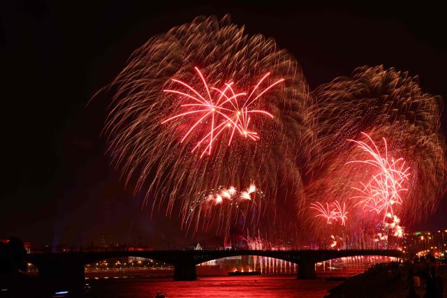 Fireworks explode over the Danube River in front of the Hungarian Parliament building as part of celebrations marking Hungary's National Day, in Budapest, on August 20, 2026. Hungary celebrated the 1,026th anniversary of the foundation of the Hungarian state, established by the first king of Hungary, Stephen I. (Photo by Attila KISBENEDEK / AFP)