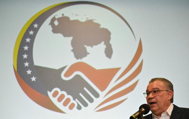 Venezuelan former presidential candidate and political ex-prisoner Enrique Marquez speaks at a press conference to present his “Pact for Venezuela” proposal in Caracas on August 20, 2026. (Photo by Juan BARRETO / AFP)