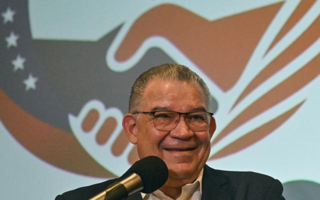 Venezuelan former presidential candidate and political ex-prisoner Enrique Marquez speaks at a press conference to present his “Pact for Venezuela” proposal in Caracas on August 20, 2026. (Photo by Juan BARRETO / AFP)