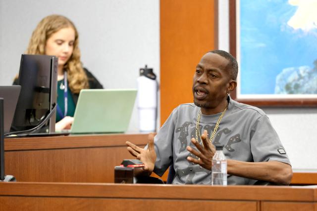 Devonta Lee, an affiliate of the gang alliance South Side Compton Crips, testifies during Duane Davis murder trial, related to the 1996 killing of rapper Tupac Shakur, at Clark County District Court at the Regional Justice Center in Las Vegas, Nevada, on August 20, 2026. The trial of the former gang leader accused of orchestrating the murder of rapper Tupac Shakur began on August 10, 30 years after one of America's most high-profile unresolved killings. The proceedings, expected to last a month, will likely not make clear who fired the shots that killed the California hip-hop legend on the night of September 7, 1996, while he was in Las Vegas to see a Mike Tyson boxing match. (Photo by Steve Marcus / POOL / AFP)