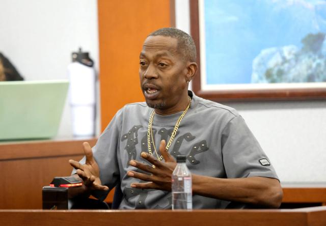 Devonta Lee, an affiliate of the gang alliance South Side Compton Crips, testifies during Duane Davis murder trial, related to the 1996 killing of rapper Tupac Shakur, at Clark County District Court at the Regional Justice Center in Las Vegas, Nevada, on August 20, 2026. The trial of the former gang leader accused of orchestrating the murder of rapper Tupac Shakur began on August 10, 30 years after one of America's most high-profile unresolved killings. The proceedings, expected to last a month, will likely not make clear who fired the shots that killed the California hip-hop legend on the night of September 7, 1996, while he was in Las Vegas to see a Mike Tyson boxing match. (Photo by Steve Marcus / POOL / AFP)