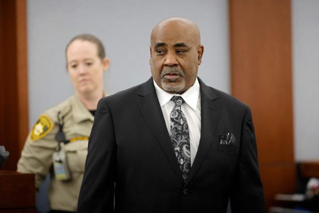 Duane Davis enters the courtroom during his murder trial, related to the 1996 killing of rapper Tupac Shakur, at Clark County District Court at the Regional Justice Center in Las Vegas, Nevada, on August 20, 2026. The trial of the former gang leader accused of orchestrating the murder of rapper Tupac Shakur began on August 10, 30 years after one of America's most high-profile unresolved killings. The proceedings, expected to last a month, will likely not make clear who fired the shots that killed the California hip-hop legend on the night of September 7, 1996, while he was in Las Vegas to see a Mike Tyson boxing match. (Photo by Steve Marcus / POOL / AFP)