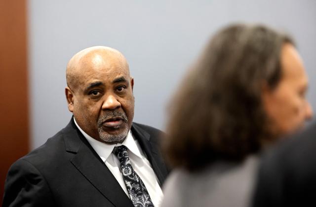 Duane Davis enters the courtroom during his murder trial, related to the 1996 killing of rapper Tupac Shakur, at Clark County District Court at the Regional Justice Center in Las Vegas, Nevada, on August 20, 2026. The trial of the former gang leader accused of orchestrating the murder of rapper Tupac Shakur began on August 10, 30 years after one of America's most high-profile unresolved killings. The proceedings, expected to last a month, will likely not make clear who fired the shots that killed the California hip-hop legend on the night of September 7, 1996, while he was in Las Vegas to see a Mike Tyson boxing match. (Photo by Steve Marcus / POOL / AFP)