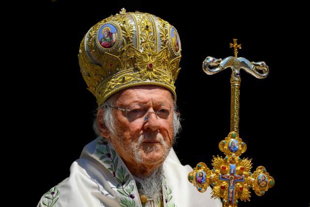 Ecumenical Patriarch Bartholomew I of Greek Orthodox Church conducts the Feast of the Dormition of the Virgin Mary, on Gokceada (Imroz) Island, Canakkale Province of Turkey, on August 15, 2026. Hundreds of Greeks return from Athens and around the world to Imbros each August 15 to celebrate the Virgin Mary. Like Istanbul and nearby Tenedos, the island was exempt from the 1923 population exchange between Greece and Turkey, which displaced more than 1.5 million people. (Photo by Yasin AKGUL / AFP)