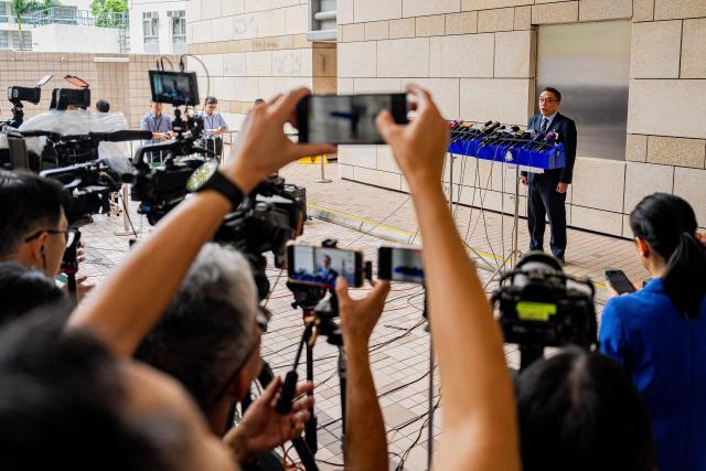 Steve Li Kwai-wah, chief superintendent of Hong Kong Police's National Security Department, speaks during a news conference after the verdict in the national security trial of two pro-democracy Tiananmen activists, in Hong Kong on August 21, 2026. A Hong Kong court found two pro-democracy activists who organised annual vigils to mark China's deadly Tiananmen crackdown guilty of "incitement to subversion" on August 21. (Photo by Leung Man Hei / AFP)
