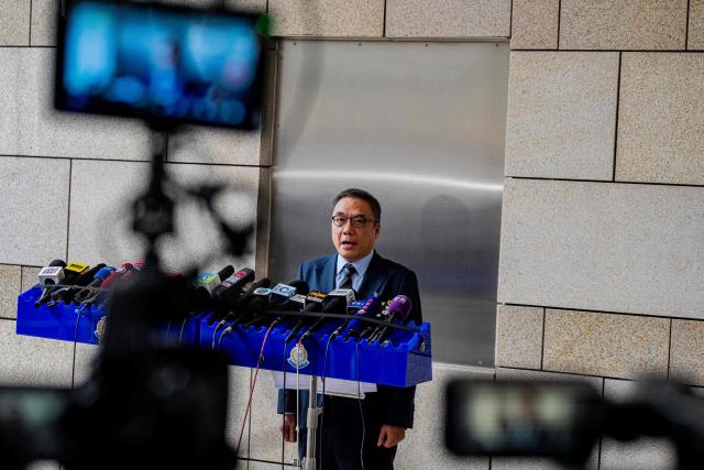 Steve Li Kwai-wah, chief superintendent of Hong Kong Police's National Security Department, speaks during a news conference after the verdict in the national security trial of two pro-democracy Tiananmen activists, in Hong Kong on August 21, 2026. A Hong Kong court found two pro-democracy activists who organised annual vigils to mark China's deadly Tiananmen crackdown guilty of "incitement to subversion" on August 21. (Photo by Leung Man Hei / AFP)
