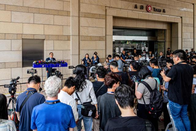Steve Li Kwai-wah, chief superintendent of Hong Kong Police's National Security Department, speaks during a news conference after the verdict in the national security trial of two pro-democracy Tiananmen activists, in Hong Kong on August 21, 2026. A Hong Kong court found two pro-democracy activists who organised annual vigils to mark China's deadly Tiananmen crackdown guilty of "incitement to subversion" on August 21. (Photo by Leung Man Hei / AFP)