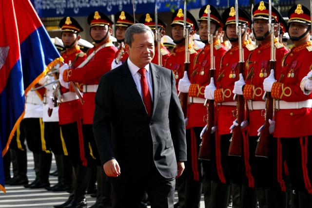 Cambodia's Prime Minister Hun Manet walks past honour guards during the inauguration ceremony of the new Senate building, known as Solidarity Palace, in Phnom Penh on August 21, 2026. (Photo by TANG CHHIN Sothy / AFP)