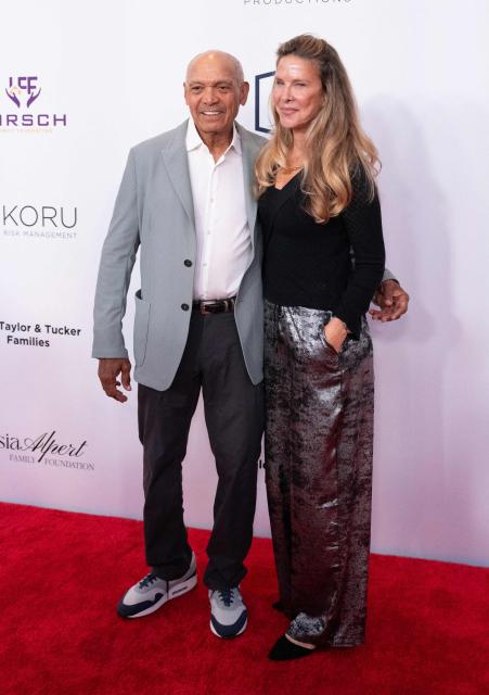 US former professional baseball player Reggie Jackson and guest attend the Harold & Carole Pump Foundation 26th Anniversary Celebrity Dinner honoring the 2025 World Champions Los Angeles Dodgers at the Beverly Hilton in Beverly Hills, California on August 20, 2026. (Photo by Connor Terry / AFP)