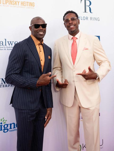 US former professional football player Terrell Owens (L) and US former basketball player
Paul Pierce (R) attend the Harold & Carole Pump Foundation 26th Anniversary Celebrity Dinner honoring the 2025 World Champions Los Angeles Dodgers at the Beverly Hilton in Beverly Hills, California on August 20, 2026. (Photo by Connor Terry / AFP)
