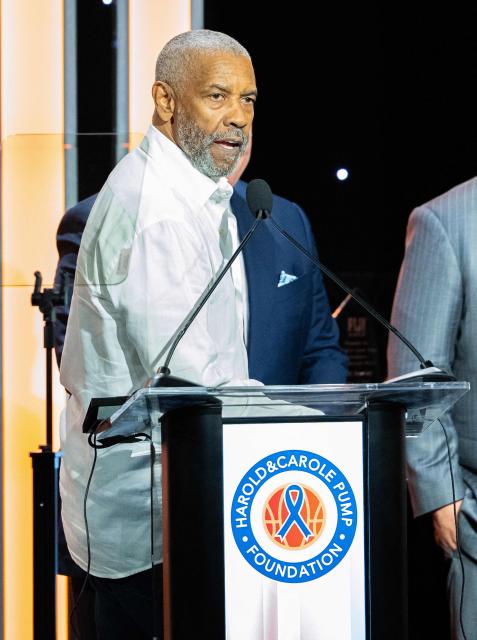 US actor Denzel Washington speaks on stage during the Harold & Carole Pump Foundation 26th Anniversary Celebrity Dinner honoring the 2025 World Champions Los Angeles Dodgers at the Beverly Hilton in Beverly Hills, California on August 20, 2026. (Photo by Connor Terry / AFP)