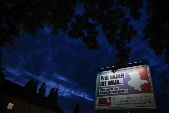 An election poster by the state of Saxony-Anhalt reading "We have a choice“ and "Your Vote for Democracy and Diversity" is ste up ahead of the Saxony-Anhalt state election in Magdeburg, eastern Germany, on August 20, 2026. Regional elections in the eastern federal state of Saxony-Anhalt will take place on September 6, 2026. (Photo by Ronny HARTMANN / AFP)