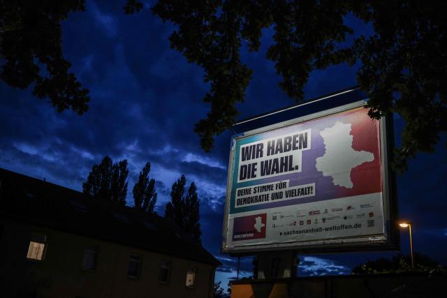 An election poster by the state of Saxony-Anhalt reading "We have a choice“ and "Your Vote for Democracy and Diversity" is ste up ahead of the Saxony-Anhalt state election in Magdeburg, eastern Germany, on August 20, 2026. Regional elections in the eastern federal state of Saxony-Anhalt will take place on September 6, 2026. (Photo by Ronny HARTMANN / AFP)