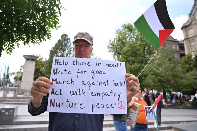 Members and supporters of the Palestinian community take part in a pro-Palestinian demonstration on August 21, 2026 in Budapest, in solidarity with Palestinian physician and director of Gaza's Kamal Adwan hospital Hussam Abu Safiya detained by Israeli forces. Several Jewish organizations criticized both the event and the authorities' decision to allow it, while police stated that they had found no legal grounds to prohibit the gathering. The controversy stems from allegations by Israeli and Jewish organizations that Abu Safiya has links to Hamas and was a member of the organization, while his supporters regard him as a political detainee and reject those accusations. (Photo by Attila KISBENEDEK / AFP)