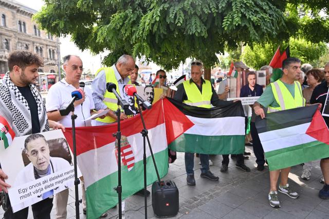 Members and supporters of the Palestinian community take part in a pro-Palestinian demonstration on August 21, 2026 in Budapest, in solidarity with Palestinians detained by Israel and with Palestinian physician and director of Gaza's Kamal Adwan hospital Hussam Abu Safiya detained by Israeli forces. Several Jewish organizations criticized both the event and the authorities' decision to allow it, while police stated that they had found no legal grounds to prohibit the gathering. The controversy stems from allegations by Israeli and Jewish organizations that Abu Safiya has links to Hamas and was a member of the organization, while his supporters regard him as a political detainee and reject those accusations. (Photo by Attila KISBENEDEK / AFP)