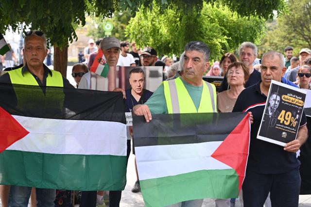 Members and supporters of the Palestinian community take part in a pro-Palestinian demonstration on August 21, 2026 in Budapest, in solidarity with Palestinians detained by Israel and with Palestinian physician and director of Gaza's Kamal Adwan hospital Hussam Abu Safiya detained by Israeli forces. Several Jewish organizations criticized both the event and the authorities' decision to allow it, while police stated that they had found no legal grounds to prohibit the gathering. The controversy stems from allegations by Israeli and Jewish organizations that Abu Safiya has links to Hamas and was a member of the organization, while his supporters regard him as a political detainee and reject those accusations. (Photo by Attila KISBENEDEK / AFP)
