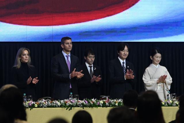Japan's Crown Prince Akishino (2-R), Princess Kiko, Paraguay's President Santiago Pena (2-L) and his wife Leticia Ocampos, applaud during the commemoration of the 90th anniversary of the Japanese immigration in Paraguay, at the Conmebol headquarters in Luque, Paraguay, on August 21, 2026. (Photo by DANIEL DUARTE / AFP)