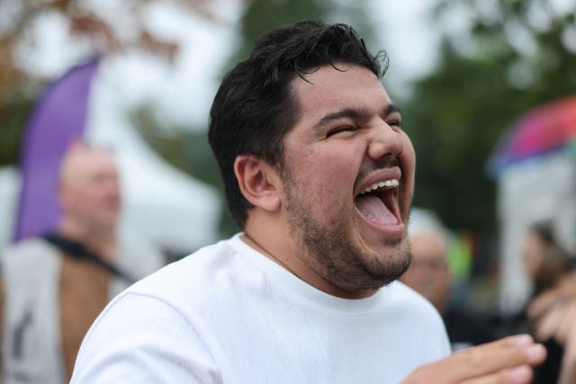 French anti-drug activist and Marseille's deputy mayor Amine Kessaci reacts during the party's "universitй d'йtй" annual summer meeting in Saint-Martin-d’Heres, eastern France, on August 21, 2026. (Photo by Alex MARTIN / AFP)
