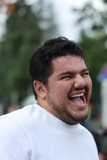 French anti-drug activist and Marseille's deputy mayor Amine Kessaci reacts during the party's "universitй d'йtй" annual summer meeting in Saint-Martin-d’Heres, eastern France, on August 21, 2026. (Photo by Alex MARTIN / AFP)