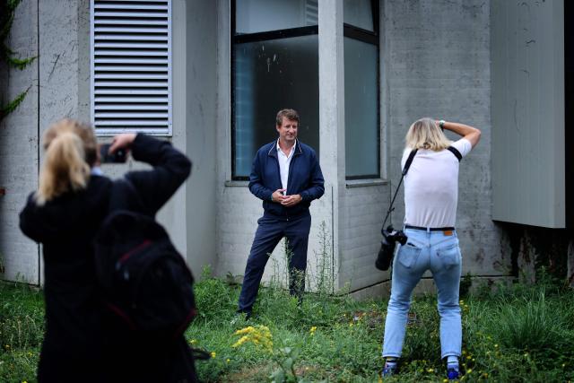 Photographers take portraits of French left-wing The Ecologistes party's senator Yannick Jadot during The Ecologistes party's "universitй d'йtй" annual summer meeting in Saint-Martin-d’Heres, eastern France, on August 21, 2026. (Photo by Alex MARTIN / AFP)