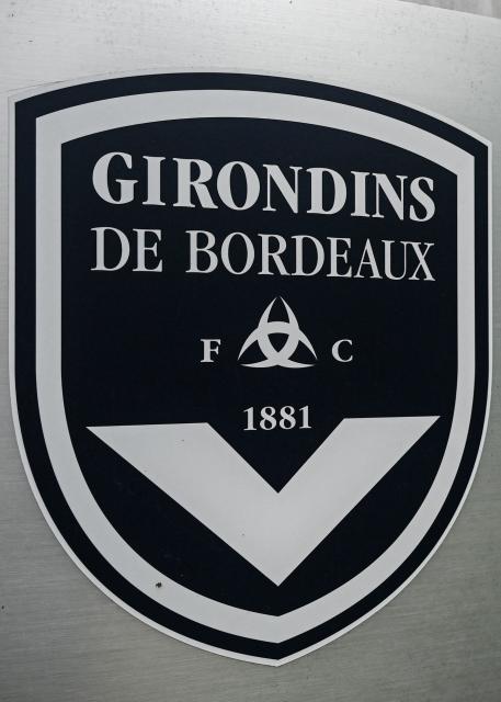 (FILES) This general view taken on May 19, 2022, shows a sign with a logo in front of the chateau of FC Girondins de Bordeaux at the club's training ground in Le Haillan, near Bordeaux, south-western France. On August 21, 2026, the Paris Administrative Court confirmed the ban on Girondins de Bordeaux from taking part in national championships, a sanction imposed in July by French sports authorities due to the club’s financial mismanagement, further burying its chances of being saved. (Photo by Philippe LOPEZ / AFP)