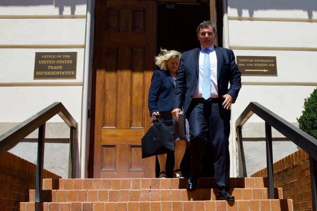 Dominic LeBlanc (R), Canada's minister in charge of US-Canada trade, leaves the Office of the United States Trade Representative (USTR) following talks with US Trade Representative Jamieson Greer in Washington, DC, on August 21, 2026, amid ongoing trade tensions between Canada and the United States. The United States and Canada were back at the negotiating table Friday, with the clock ticking down to a midnight deadline when punishing new US tariffs kick in. (Photo by Amid FARAHI / AFP)
