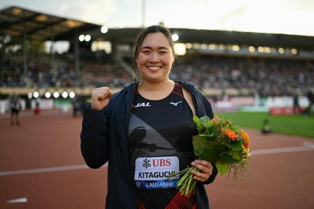 Japan's Haruka Kitaguchi poses for a photograph as she celebrates winning the women's Javelin Throw during the World Athletics Diamond League athletics meeting at the Stade Olympique de la Pontaise in Lausanne, on August 21, 2026. (Photo by Fabrice COFFRINI / AFP)
