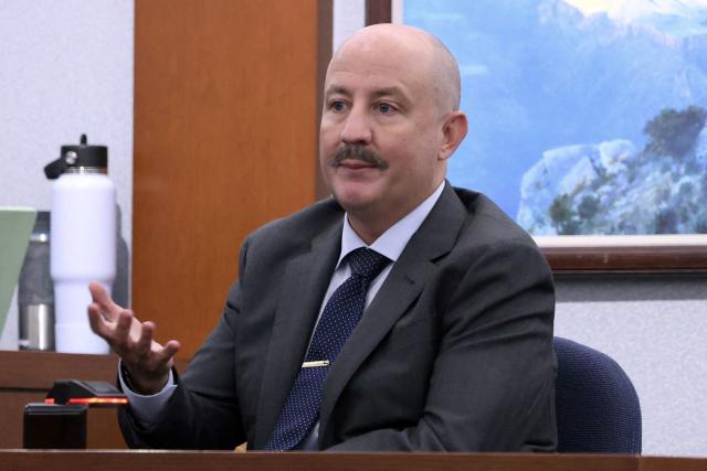 Michael Dorsey, a documentary filmmaker, television producer, and editor, takes the witness stand during the murder trial of Duane Davis, related to the 1996 killing of rapper Tupac Shakur, at Clark County District Court at the Regional Justice Center in Las Vegas, Nevada, on August 21, 2026. The trial of the former gang leader accused of orchestrating the murder of rapper Tupac Shakur began on August 10, 30 years after one of America's most high-profile unresolved killings. The proceedings, expected to last a month, will likely not make clear who fired the shots that killed the California hip-hop legend on the night of September 7, 1996, while he was in Las Vegas to see a Mike Tyson boxing match. (Photo by Bizuayeha TESFAYE / POOL / AFP)