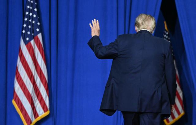 US President Donald Trump waves as he leaves after speaking at a campaign rally for US Senator Darline Graham at Myrtle Beach Convention Center in Myrtle Beach, South Carolina on August 21, 2026. (Photo by SAUL LOEB / AFP) / ALTERNATIVE CROP