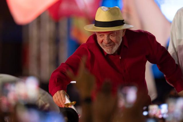 Brazil's President Luiz Inacio Lula da Silva greets supporters during a campaign rally at Praca da Estacao in Belo Horizonte, Minas Gerais state, Brazil on August 21, 2026. Brazilians will go to the polls next October 4 once again deeply polarized and under the shadow of US President Donald Trump, who has backed conservative candidates in recent elections in Latin America. (Photo by Douglas MAGNO / AFP)