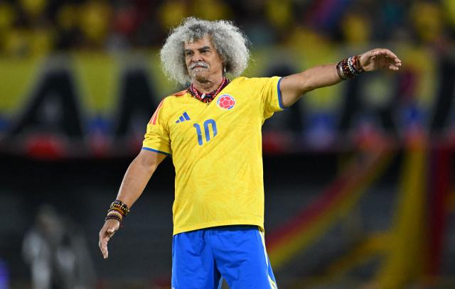 Colombian football legend Carlos Valderrama attends a football match to raise funds for the victims of an 7.4 earthquake, at El Campin stadium in Bogota on August 21, 2026. The powerful earthquake that killed hundreds of people in western Colombia caused $9.57 billion in economic losses, President Abelardo de la Espriella said on August 18, issuing a preliminary estimate. (Photo by Raul ARBOLEDA / AFP)