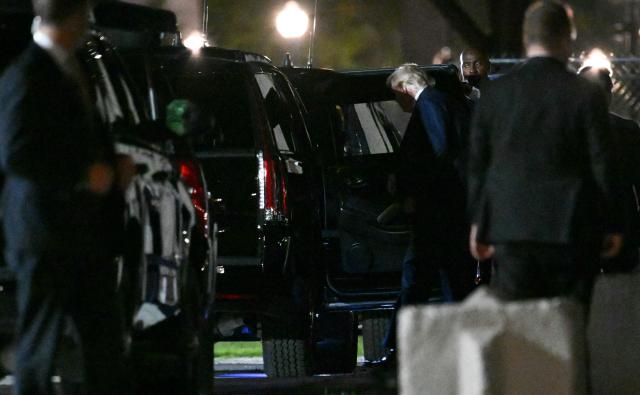 US President Donald Trump boards his vehicle after disembarking from Marine One upon landing on the Ellipse near the White House in Washington, DC, on August 21, 2026. US President Donald Trump returns from South Carolina where he attended a campaign rally for US Senator Darline Graham. (Photo by Mandel NGAN / AFP)