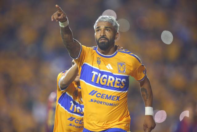 Tigres’ Uruguayan forward #17 Rodrigo Aguirre celebrates after scoring the opening goal during the Liga MX Apertura football match between Tigres and Atlante at the Universitario stadium in San Nicolas de los Garza, Nuevo Leon, Mexico on August 21, 2026. (Photo by Julio Cesar AGUILAR / AFP)