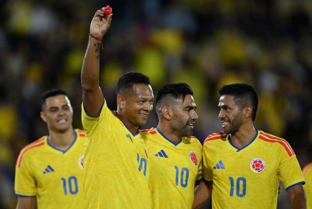 Former Colombian player Fredy Guarin, forward Radamel Falcao and former player Fabian Vargas attend a football match to raise funds for the victims of an 7.4 earthquake, at El Campin stadium in Bogota on August 21, 2026. The powerful earthquake that killed hundreds of people in western Colombia caused $9.57 billion in economic losses, President Abelardo de la Espriella said on August 18, issuing a preliminary estimate. (Photo by Raul ARBOLEDA / AFP)