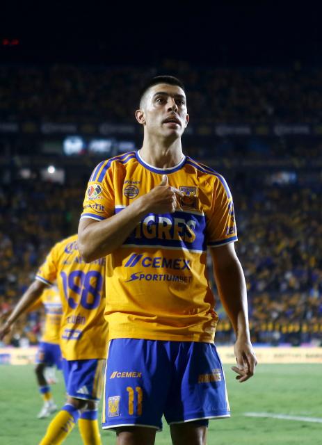 Tigres' Argentine midfielder #11 Juan Brunetta celebrates after scoring his team's second goal during the Liga MX Apertura football match between Tigres and Atlante at the Universitario stadium in San Nicolas de los Garza, Nuevo Leon, Mexico on August 21, 2026. (Photo by Julio Cesar AGUILAR / AFP)