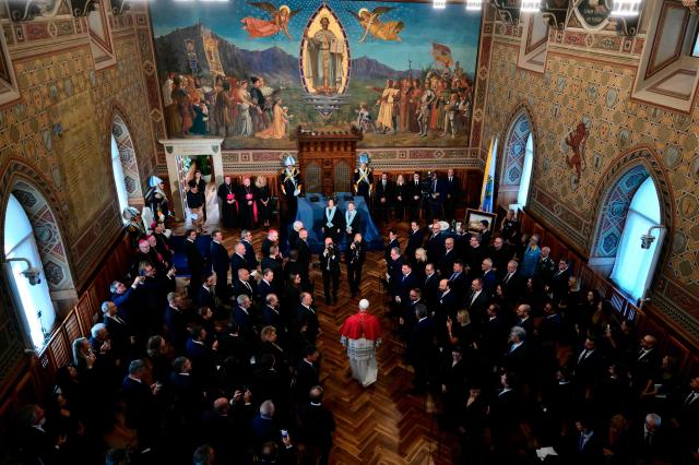 Pope Leo XIV is welcomed by Captains Regent of San Marino Alice Mina and Vladimiro Selva  at the Public Palace during a pastoral visit to San Marino, on August 22, 2026. (Photo by Stefano RELLANDINI / AFP)