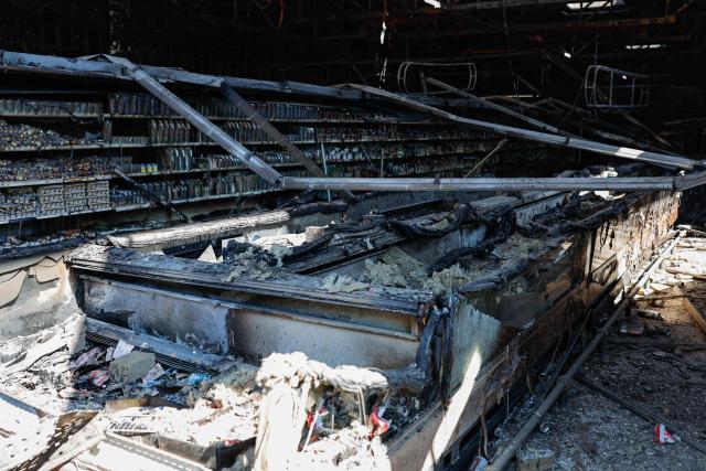 This photograph shows a view of a shopping mall damaged following a Russian strike in Kryvyi Rih, on August 22, 2026, amid the Russian invasion of Ukraine. Russian drones slammed into a busy shopping centre in eastern Ukraine on August 21, killing 16 people in an attack condemned as "cynical and despicable" by President Volodymyr Zelensky. (Photo by Yan Dobronosov / AFP)