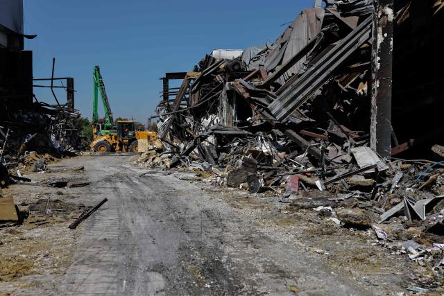This photograph shows a view of a shopping mall damaged following a Russian strike in Kryvyi Rih, on August 22, 2026, amid the Russian invasion of Ukraine. Russian drones slammed into a busy shopping centre in eastern Ukraine on August 21, killing 16 people in an attack condemned as "cynical and despicable" by President Volodymyr Zelensky. (Photo by Yan Dobronosov / AFP)