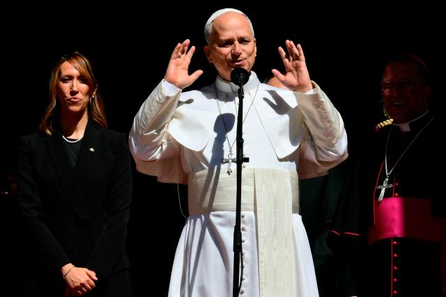 Pope Leo XIV greets the crowd outside San Marino's basilica during a pastoral visit on August 22, 2026. (Photo by Stefano RELLANDINI / AFP)