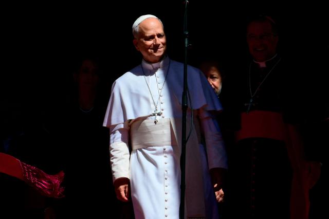 Pope Leo XIV greets the crowd outside San Marino's basilica during a pastoral visit on August 22, 2026. (Photo by Stefano RELLANDINI / AFP)