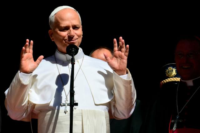 Pope Leo XIV greets the crowd outside San Marino's basilica during a pastoral visit on August 22, 2026. (Photo by Stefano RELLANDINI / AFP)