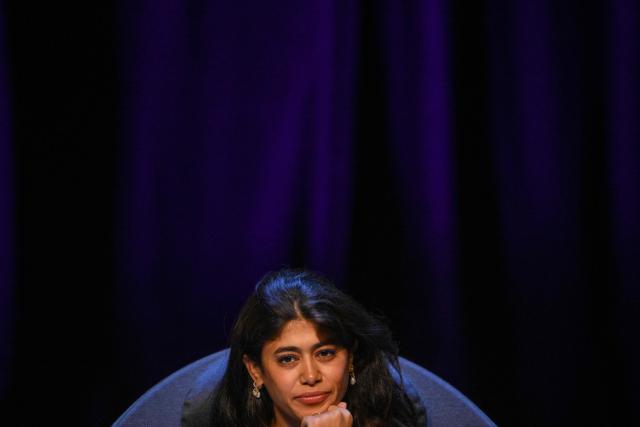 French-Palestinian member of the European Parliament Rima Hassan takes part in a discussion during the 'Amfis' party Summer Conferences 'Universites d'été' (Summer Seminars) of the French left wing party La France Insoumise (LFI) in Châteauneuf-sur-Isère, southeastern France, on August 22, 2026. With more than 8,000 people expected during the weekend, La France Insoumise had never organized summer universities this important. A militant fervor which, combined with Jean-Luc Melenchon's good polls, pushes LFI supporters to believe in victory in the 2027 French presidential election. (Photo by OLIVIER CHASSIGNOLE / AFP)